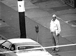 Here Polyakov is photographed waiting for his contact in New York